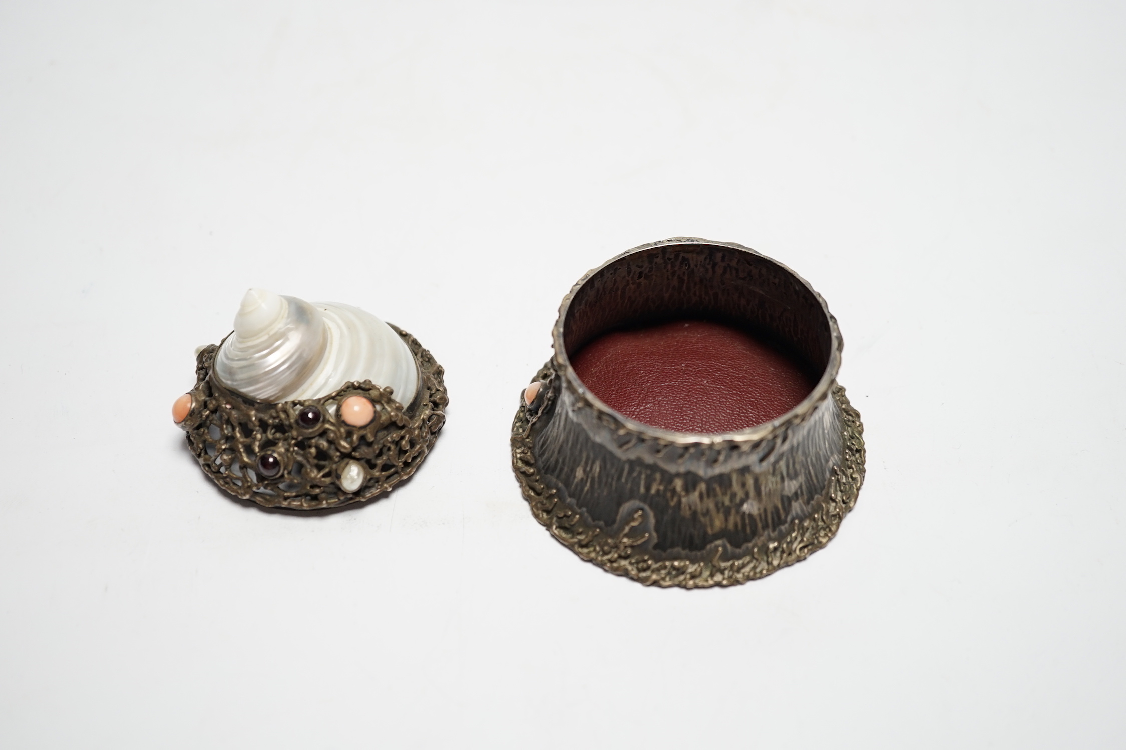 A late 20th century Polish 800 standard white metal, mother of pearl coral and cabochon garnet set rustic pot and cover, Krakow mark, height 67mm.